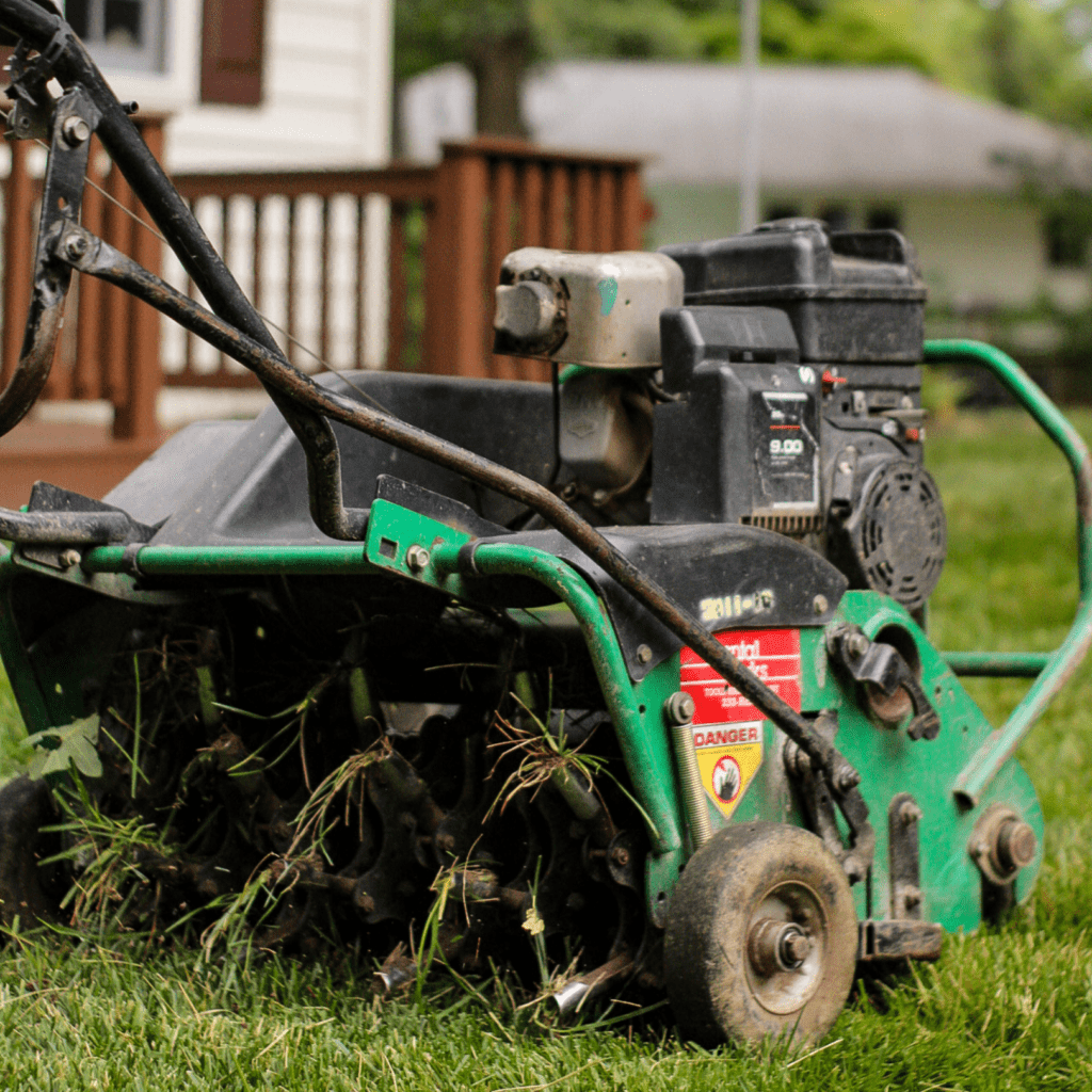 grounds management crew aeration and seeding