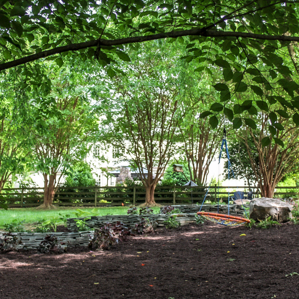 fresh landscaping with retaining walls to prevent erosion