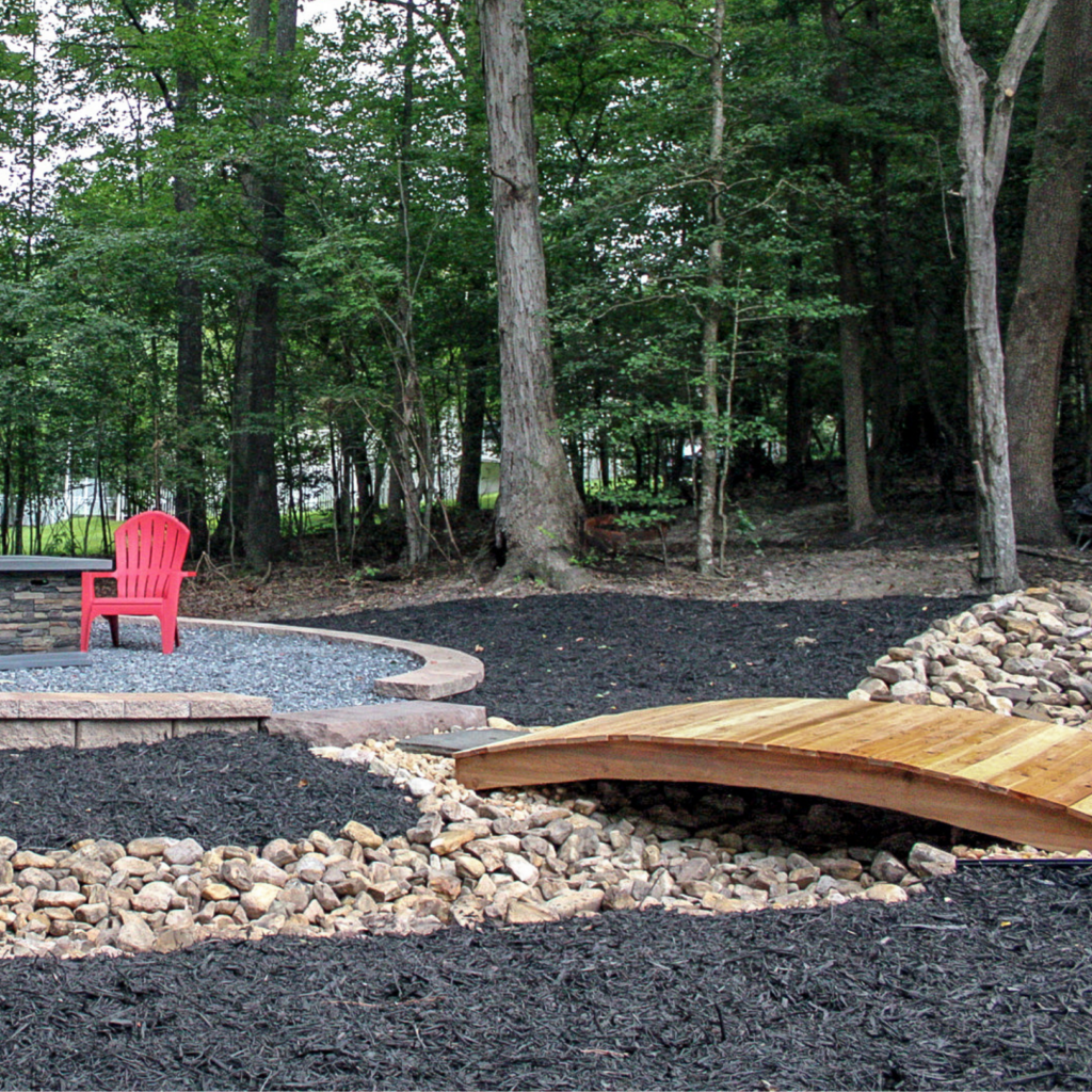 Slate chip patio and dry creek with walkway