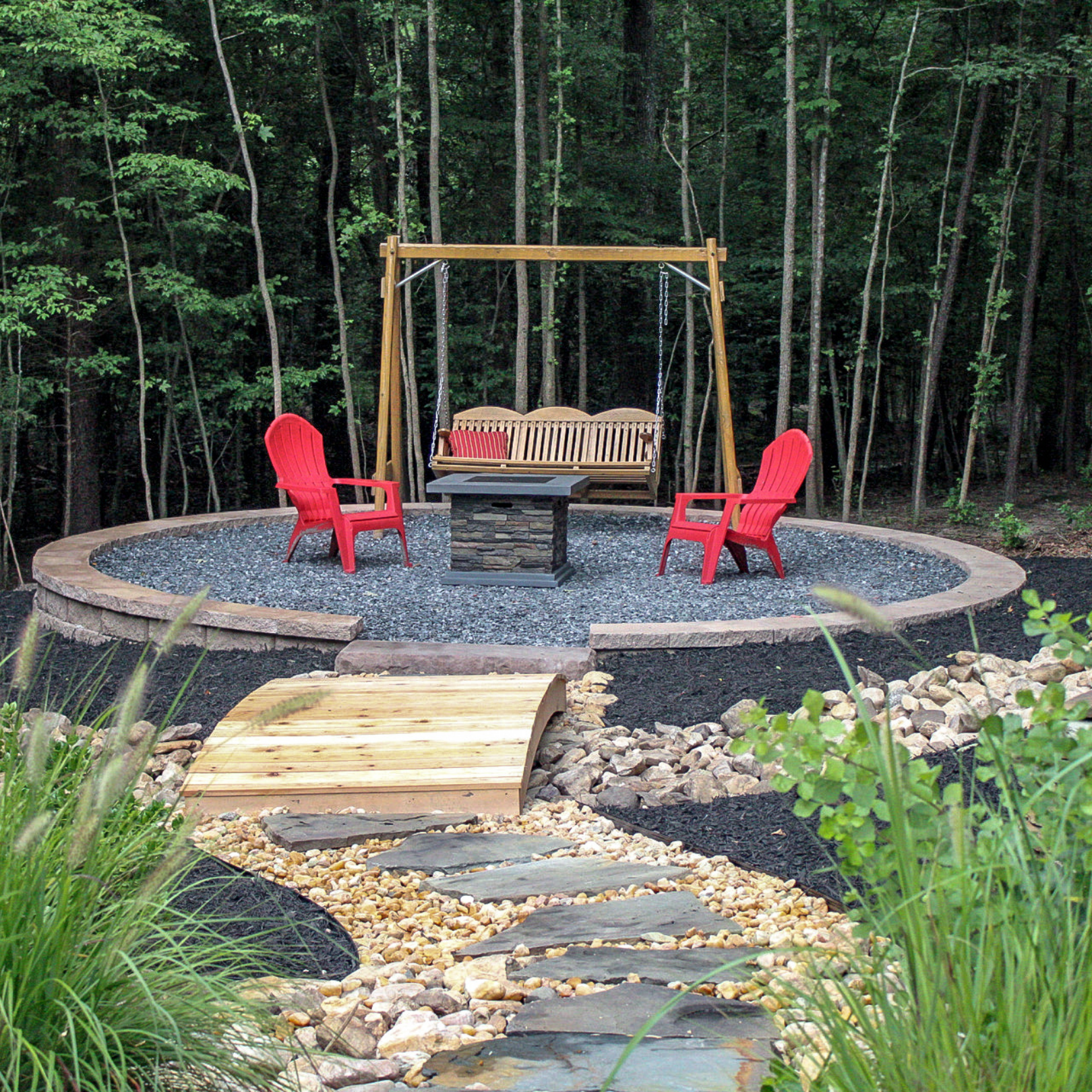 Slate chip patio and dry creek with walkway