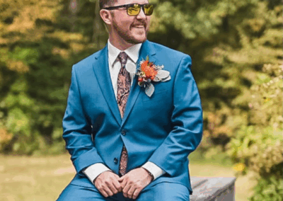 groom sitting on bench