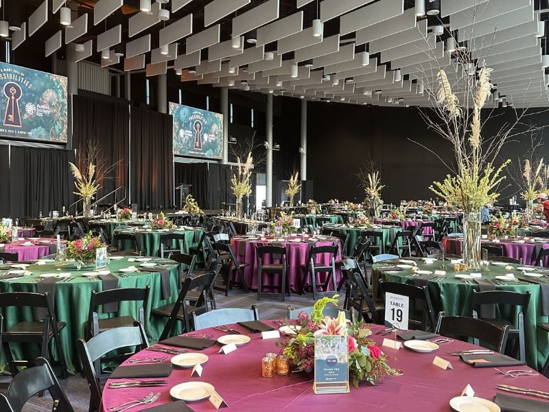 banquet hall with floral arrangements on the tables 