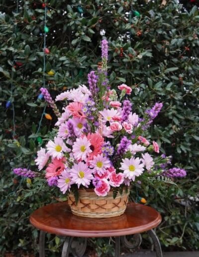 Pink and purple floral baskets.