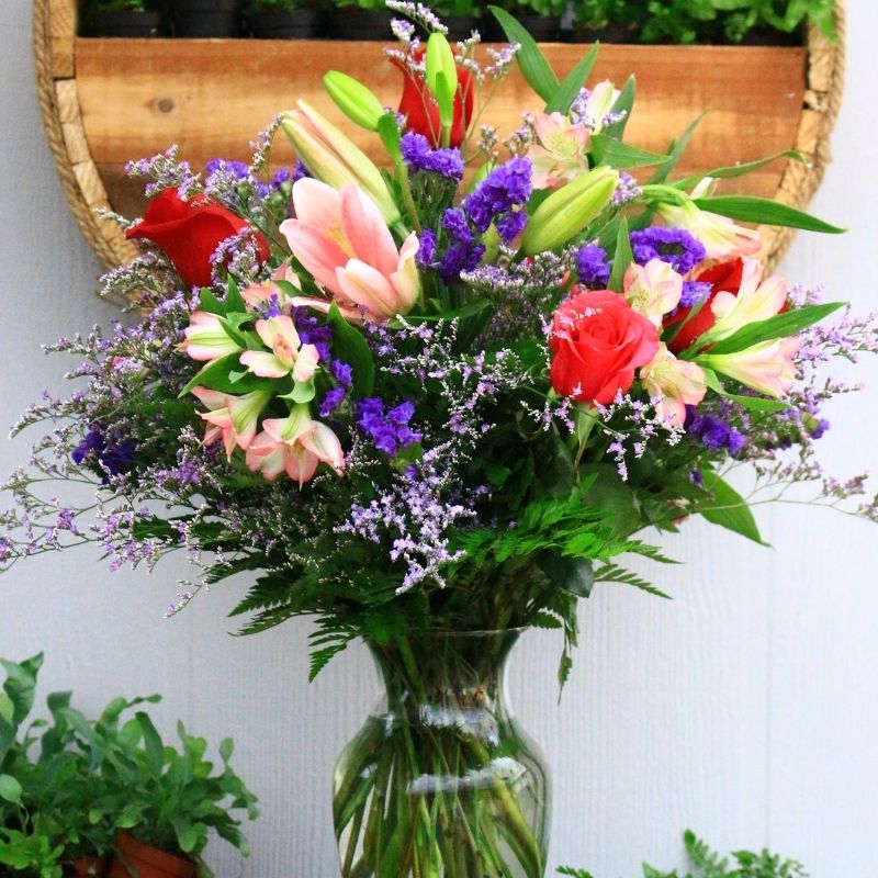 Floral arrangement created by Cross Creek Florist.