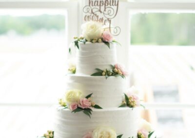 white wedding cake with florals