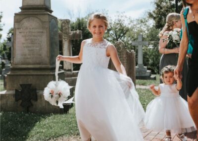 flower girl holding flower basket