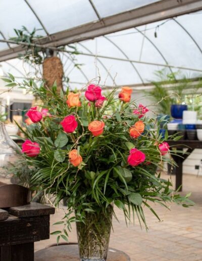 Rose vase with pink and orange roses.