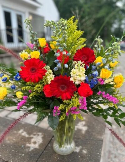 Floral arrangement multi color flowers