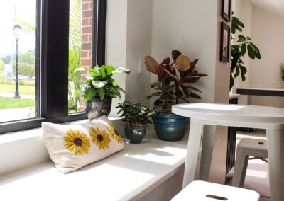 Restaurant resting area featuring professionally maintained live plants.