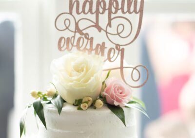 Floral cake arrangement created by Cross Creek Florist.