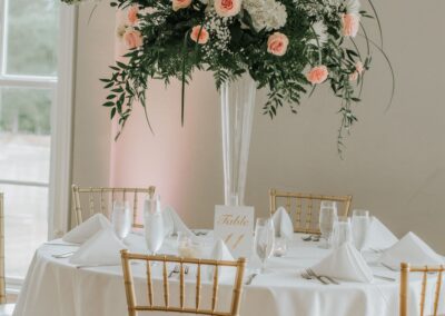 Floral centerpiece arrangement created by Cross Creek Florist.