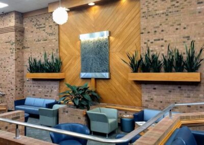 Workstation featuring light and biophilic plant design.