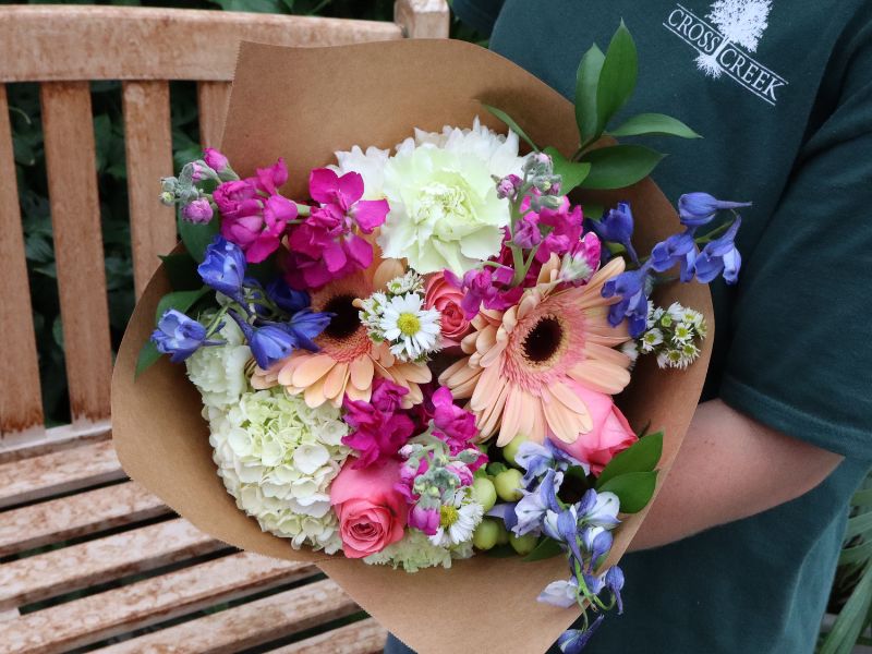 Wrapped bouquet at stem bar.