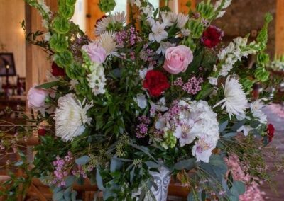Floral arrangement at wedding from Cross Creek Florist.