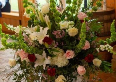 Floral arrangement at wedding from Cross Creek Florist.